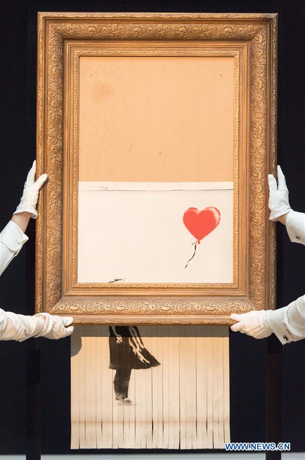 BRITAIN-LONDON-BANKSY-LOVE IS IN THE BIN