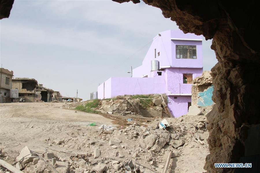 IRAQ-MOSUL-1ST HOUSE AMONG RUBBLE