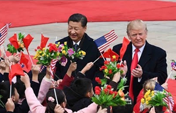 Xi and Trump hold talks on second day of US president's visit