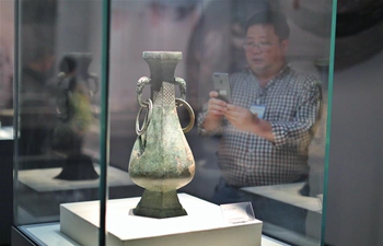 Visitors view exhibits at Guizhou Provincial Museum